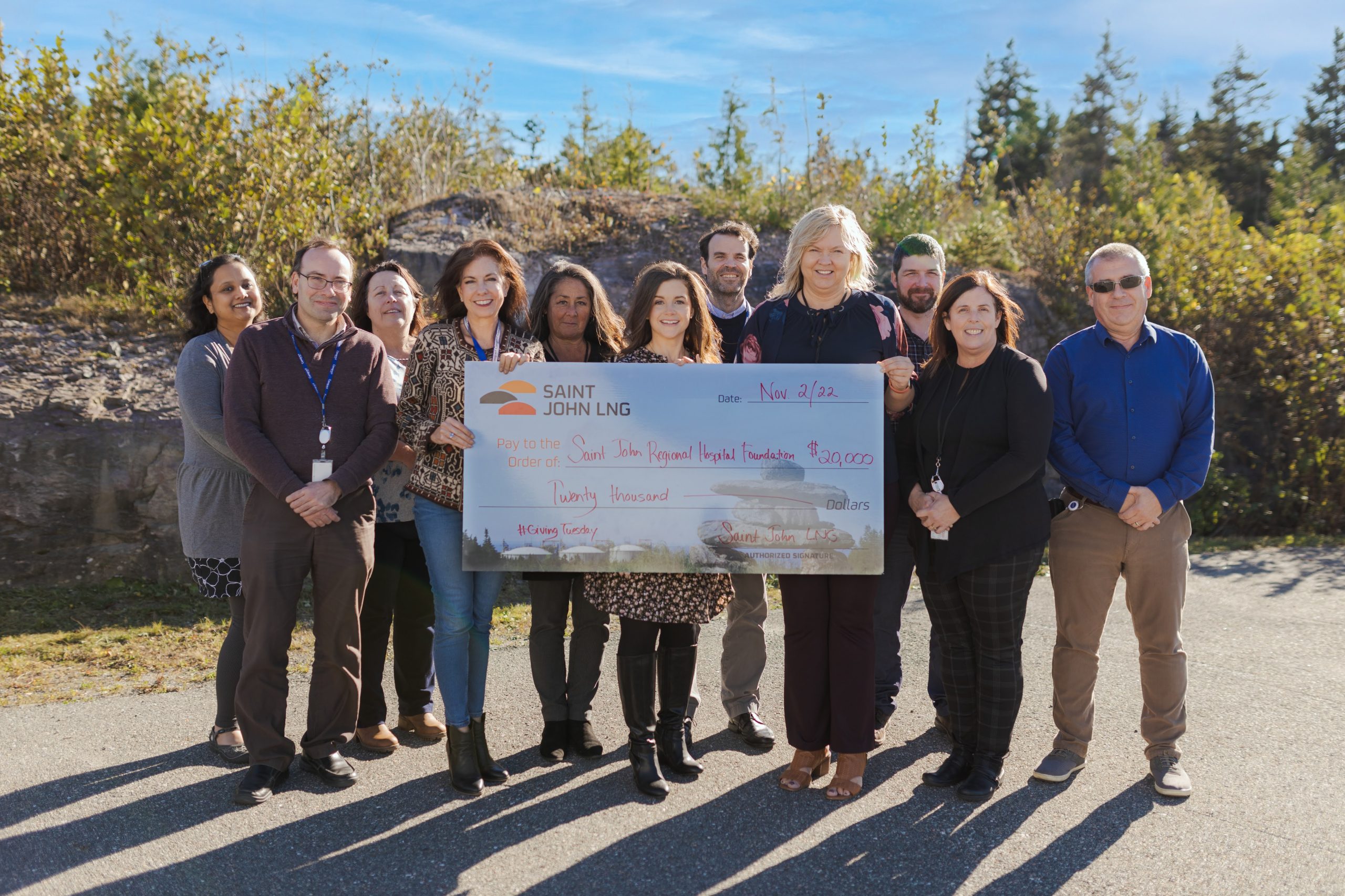 Staff of Saint John LNG are joined by Andrea Watling of the Saint John Regional Hospital to present their cheque of $20,000 as the matching partner for Giving Tuesday.